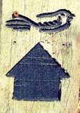 Sandlings logo of a stylised nightjar on a wooden post, with a bold black arrow