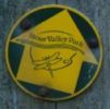 Stour Valley Path green and yellow waymarker disc on wooden post